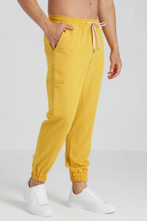 Spodnie medyczne joggery męskie - Sokrates - Golden hour