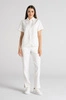Eleganckie spodnie medyczne damskie z rozcięciem - Esther - Feather white - Kangoomed by Emily