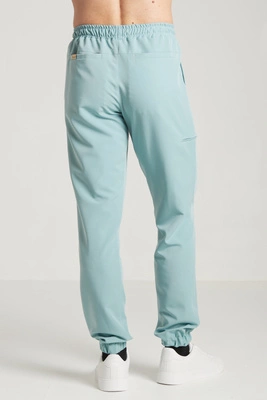 Spodnie medyczne joggery męskie - Sokrates - Sky blue