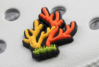 Crocs charm - Seaweed orange