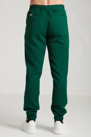 Spodnie medyczne joggery męskie - Sokrates - Pine green